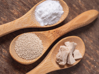 yeast on wood background