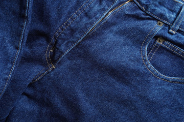 Naklejka premium Jeans background. Denim jeans texture. Blue denim pattern.