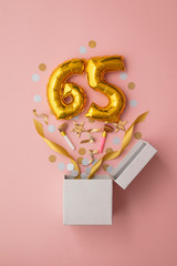 Number 65 birthday balloon celebration gift box lay flat explosion