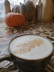 cofee and the pumpkin on background