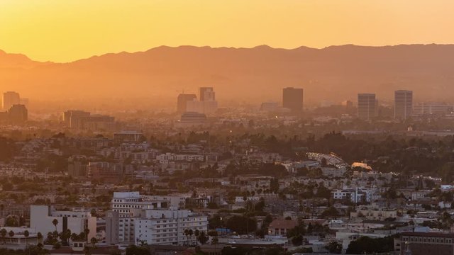 Los Angeles And Beverly Hills Sunset Skyline From Culver City Time Lapse Pan Left