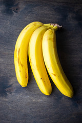 Fresh tasty banana on wooden background