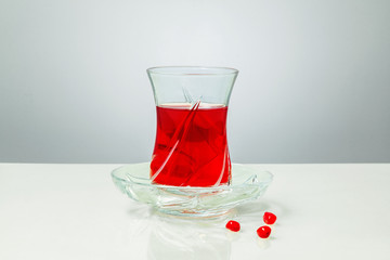 Turkish pomegranate tea on a light background close-up