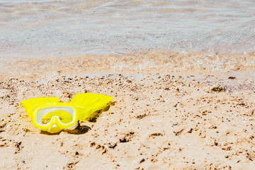 Fototapeta na wymiar yellow swimming flippers and mask