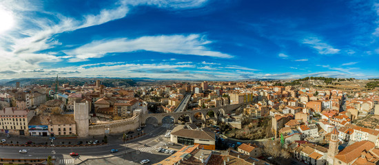 Aerial panoramic view of Teruel Spain with medieval city walls, viaduct, aquaduct and semi circular...