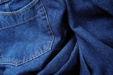 Naklejka premium Jeans background. Denim jeans texture. Blue denim pattern.