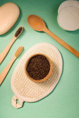 Cosmetic sours for the body, against a mint background.