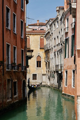 Fototapeta na wymiar Narrow Canal in Venice