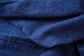 Jeans background. Denim jeans texture. Blue denim pattern.