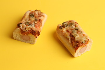 hot dog with cheese and pepper