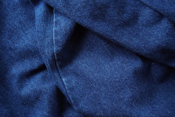 Naklejka premium Jeans background. Denim jeans texture. Blue denim pattern.