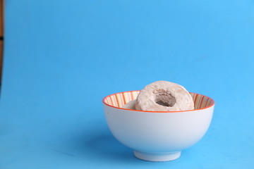 homemade bagel with sugar in bowl