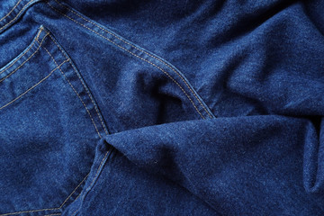 Naklejka premium Jeans background. Denim jeans texture. Blue denim pattern.