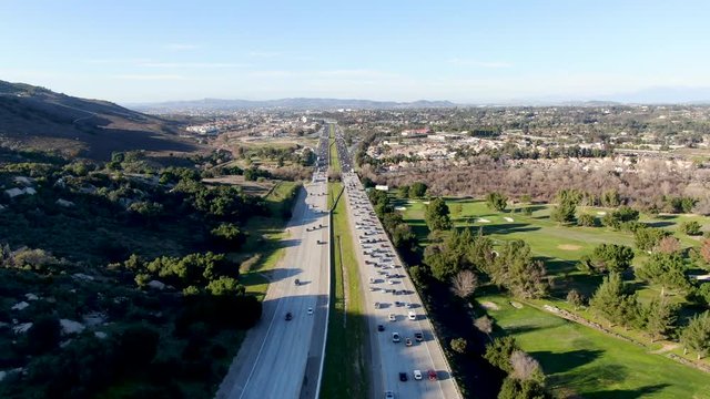 Aerial view of Temecula Valley freeway during sunny day. California highway, USA. 