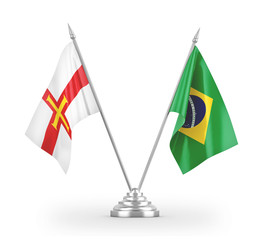 Brazil and Guernsey table flags isolated on white 3D rendering