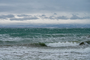 Winter sea landscape. Cold winter day on the beach. 