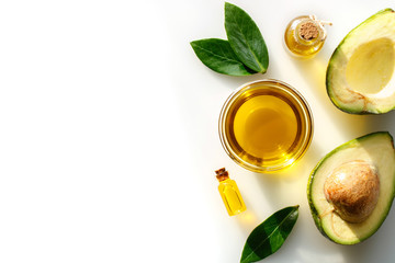 Avocado oil for healthy skin and hair on a white background.