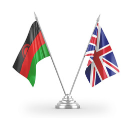 United Kingdom and Malawi table flags isolated on white 3D rendering