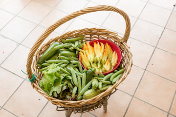 Fototapeta na wymiar Basket with seasonal vegetables