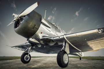 historical  aircraft on an airfield - obrazy, fototapety, plakaty