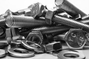 Steel bolts nuts and washers isolated on a white background