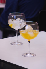 Drinks with ice on a bar table in the street