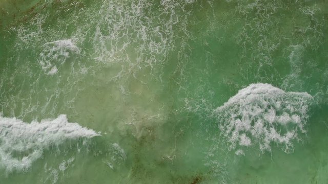 Aerial view of the inflow and sea with floating algae.