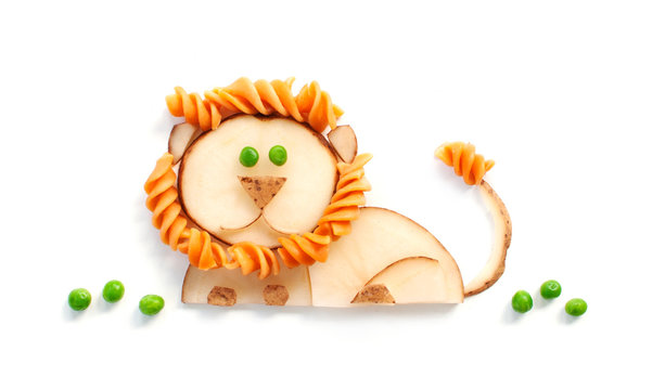 Lion food art, kids snack made from healthy food, studio shot on white background
