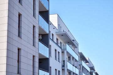 Fototapeta premium Multistory new modern apartment building with architectural details of modern architecture. 