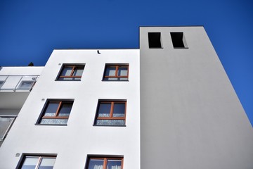 Multistory new modern apartment building with architectural details of modern architecture. 