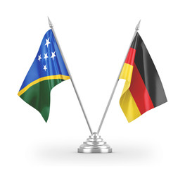 Germany and Solomon Islands table flags isolated on white 3D rendering