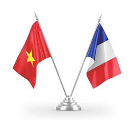 France and Vietnam table flags isolated on white 3D rendering