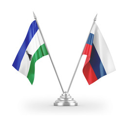 Russia and Lesotho table flags isolated on white 3D rendering