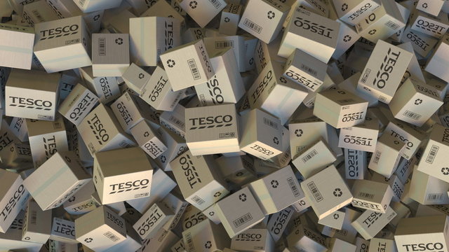 TESCO logo on piled cartons. Editorial 3D rendering