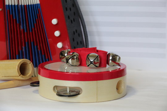 Tambourine Jingle Bells and Accordion on Music Background