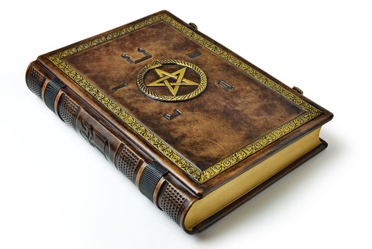 Leather book with magical symbols all over the cover. Gilded ouroboros and pentagram in the center, surrounded with old Egyptian symbols of the five elements. On the book spine is Ankh symbol.