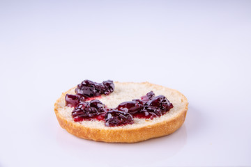  phased assembly of a hamburger on a light background