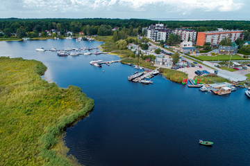 Aerial View of multiple yachts and boats in the dock