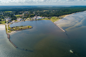 Aerial View of sea gates and  multiple yachts and boats in the dock.