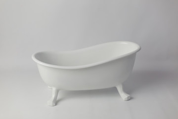 background texture. children's bath for photo sessions. white bath in classic style
