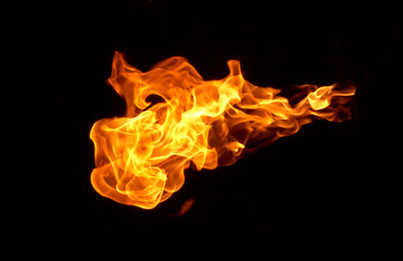 Fototapeta premium Fire flames on a black background