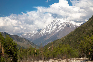 Obraz premium Overcast in mountains. Beautiful mountain rocks in clouds. Landscape of the North Caucasus