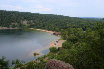 Beautiful Wisconsin summer nature background. Areal view on the North shore beach and lake from East Bluff hiking trail. Devil's Lake State Park, Baraboo area, Wisconsin, Midwest USA.