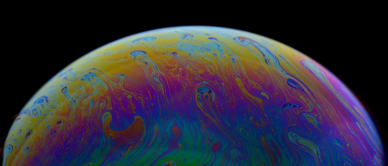 Curve of rainbow colors created by soap,wall art, colors mix signer from oil makes can use background,Fancy Dream Cloud of oil mixed.