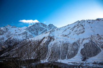 Winter in mountains. The mountain gorge in snow. Landscape of the North Caucasus