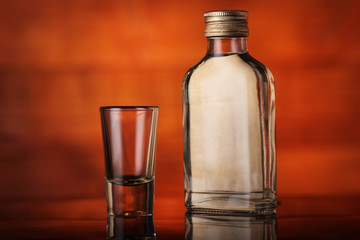 one hundred vodka with a glass