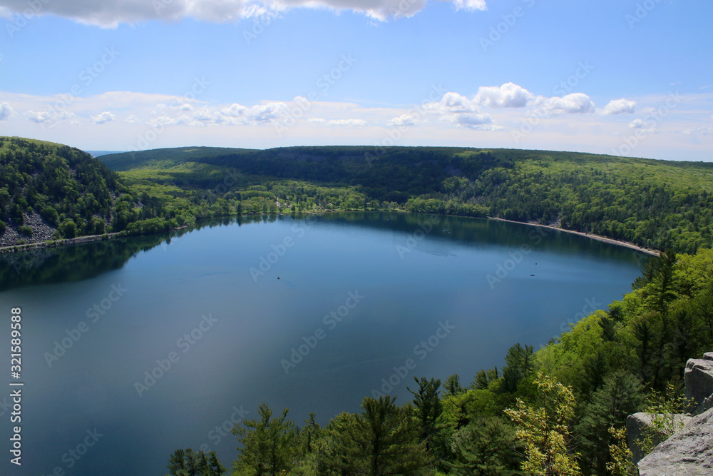 Wall mural beautiful wisconsin late spring nature background. areal view on the lake from west bluff rocky ice 