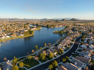 Aerial view of Menifee Lake and neighborhood, residential subdivision vila during sunset. Riverside...