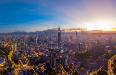 Fototapeta na wymiar Aerial panoramic view of sunrise over Kuala Lumpur city skyline. 