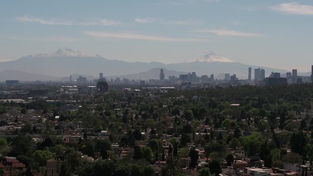 Mexico City Mountains and vulcanoes with trees drone shot